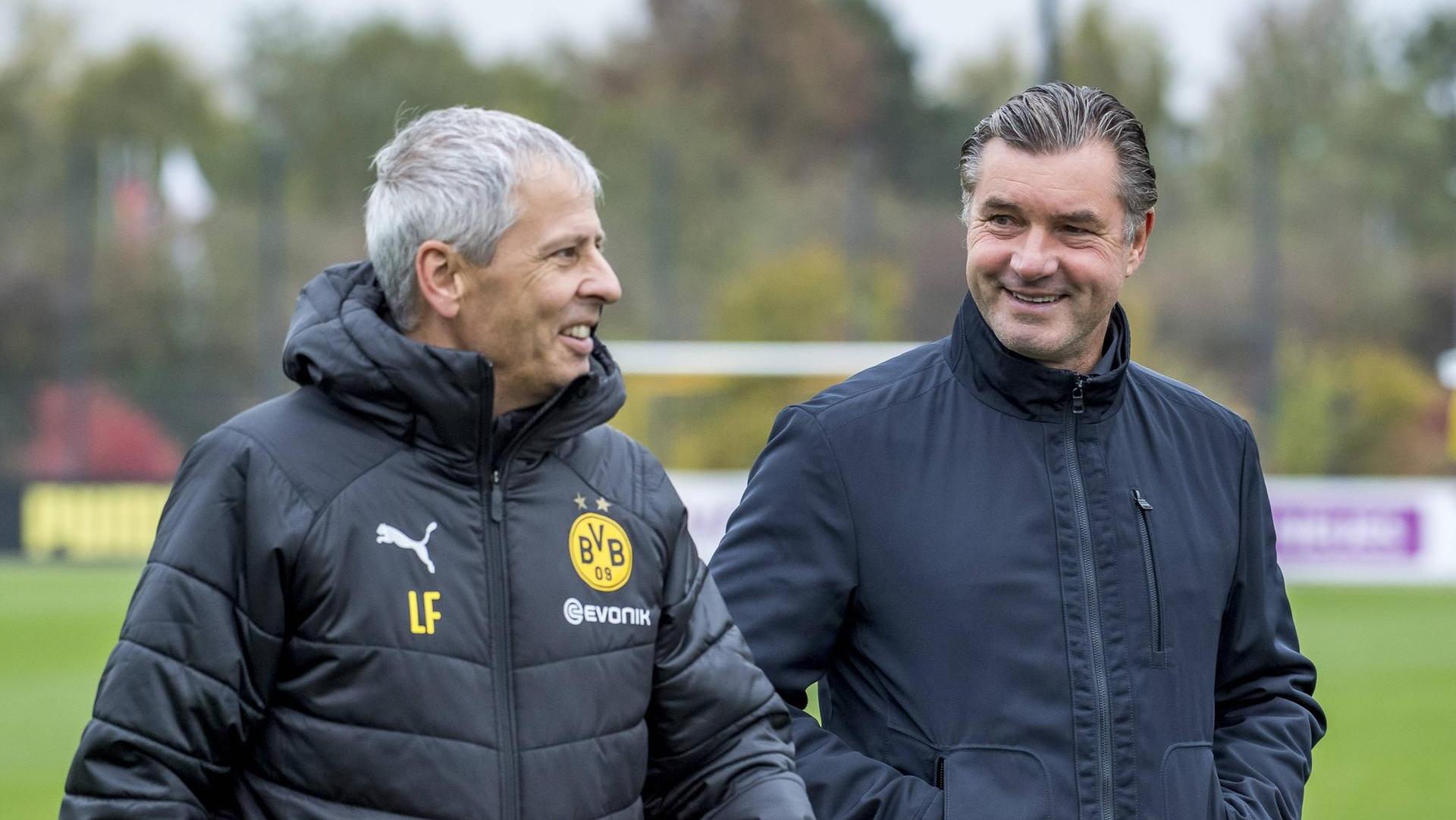 dortmunder erfolgsduo sportdirektor michael zorc r ist begeistert von der arbeit von trainer lucien favre