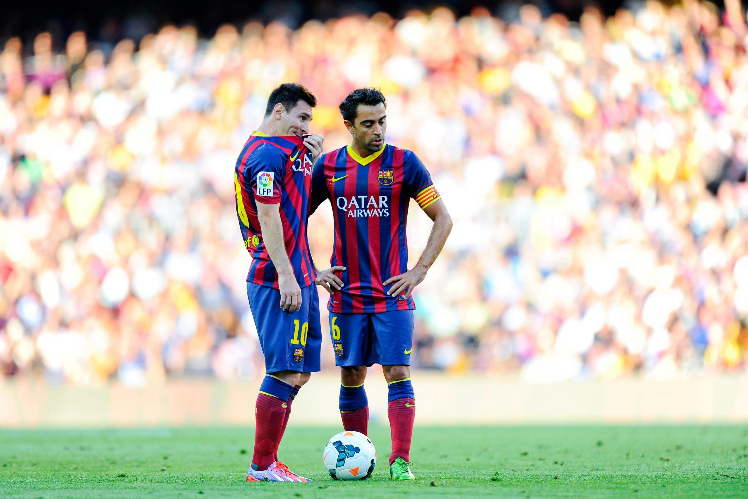 hi res 176915724 lionel messi and xavi hernandez of fc barcelona looks crop north scaled