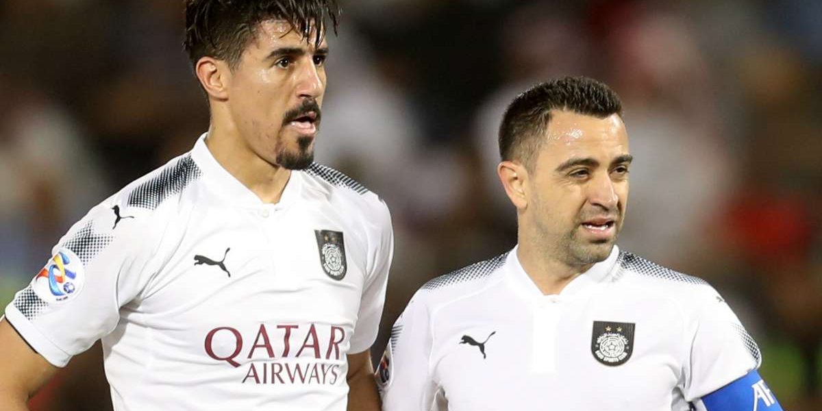 bounedjah and xavi hernandez in a al sadd game 1j4gnwsmxoszm1x9qi0n15p8nt