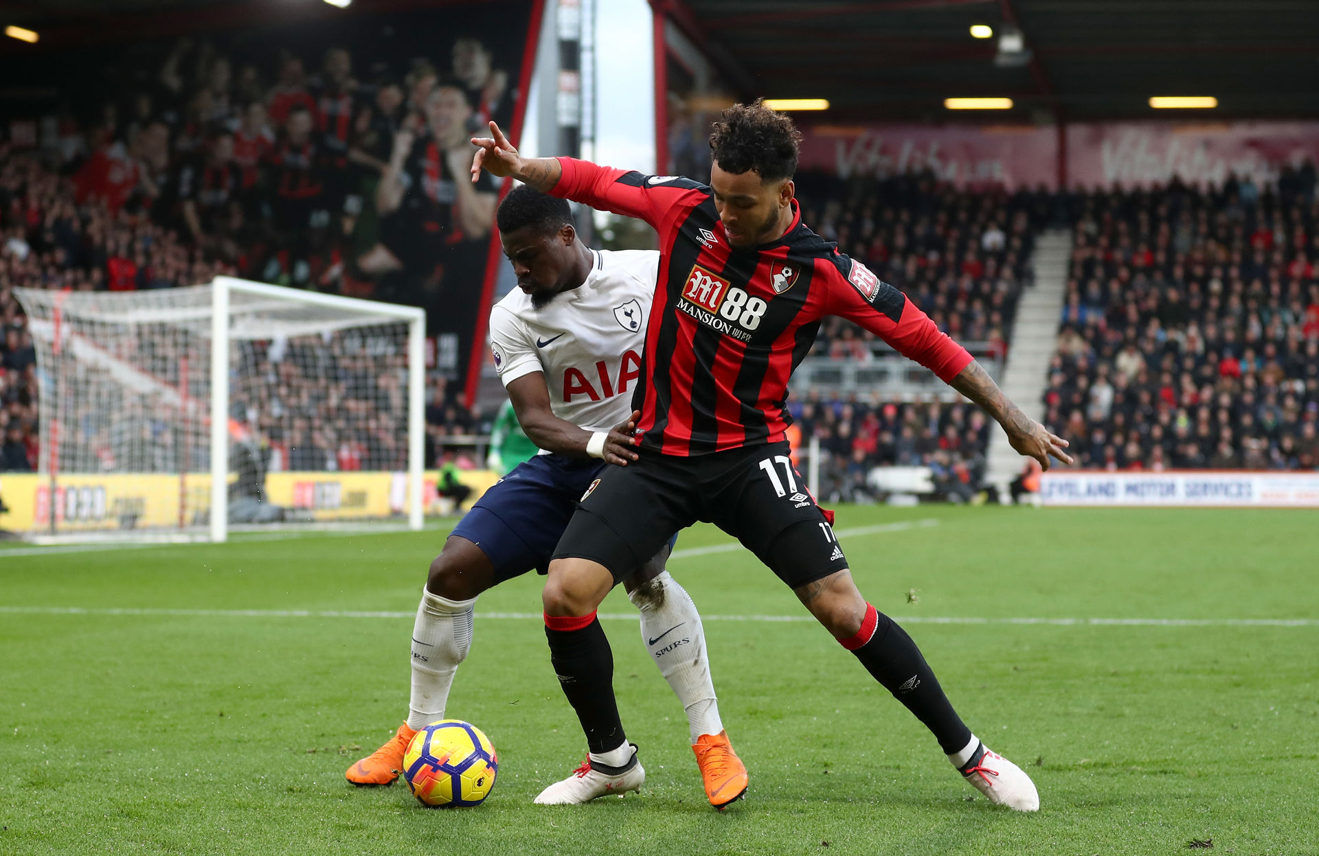 joshua king of afc bournemouth is challenged by serge aurier of 726282