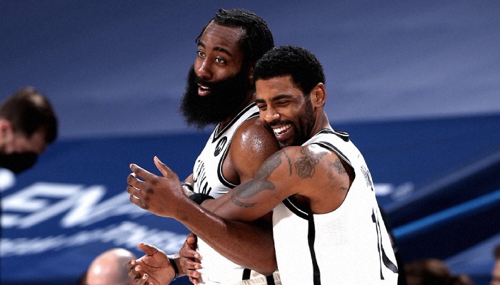 NBA Kyrie Irving James Harden Nets hug calin