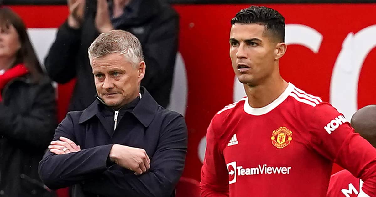 man utd manager ole gunnarsolskjaer standing alongside cristiano ronaldo 2021