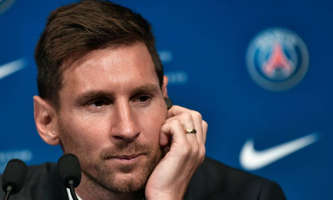 94773429 Argentinian football player Lionel Messi looks on during a press conference at his unve