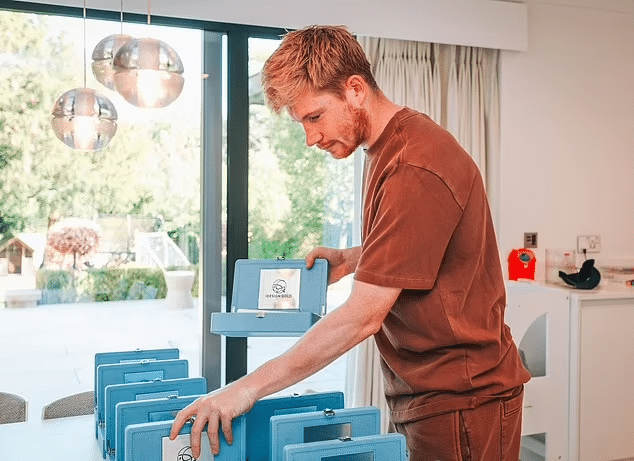 De Bruyne avec des iphones